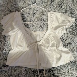 Super cute Francesca’s tie blouse! not sure if I want to sell send offers! 🪩